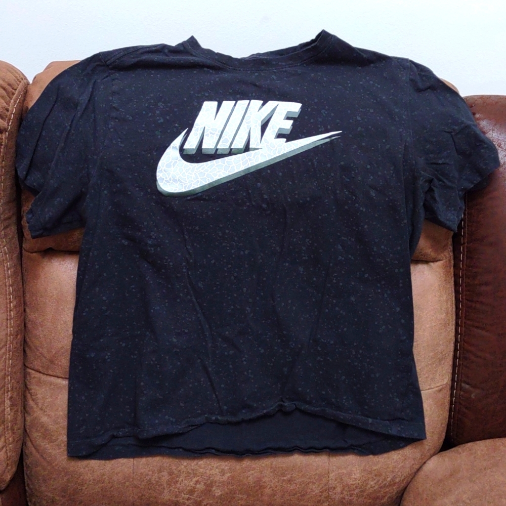 L Nike tee shirt shrank to about a size M
